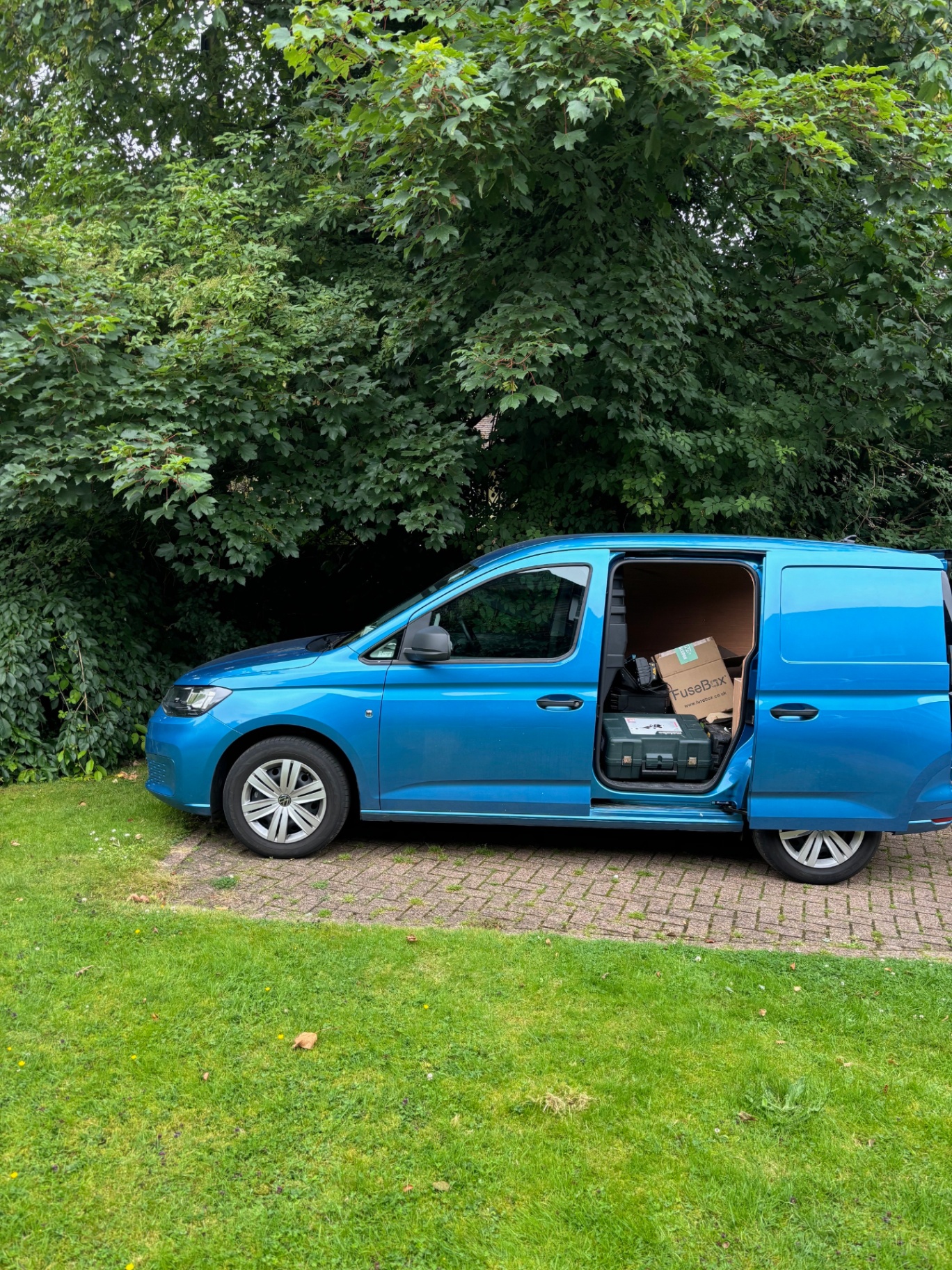 Side view of branded electrical service van