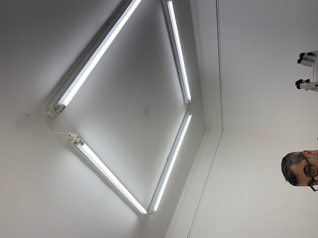 LED strip lighting installation on a ceiling for ambient room lighting