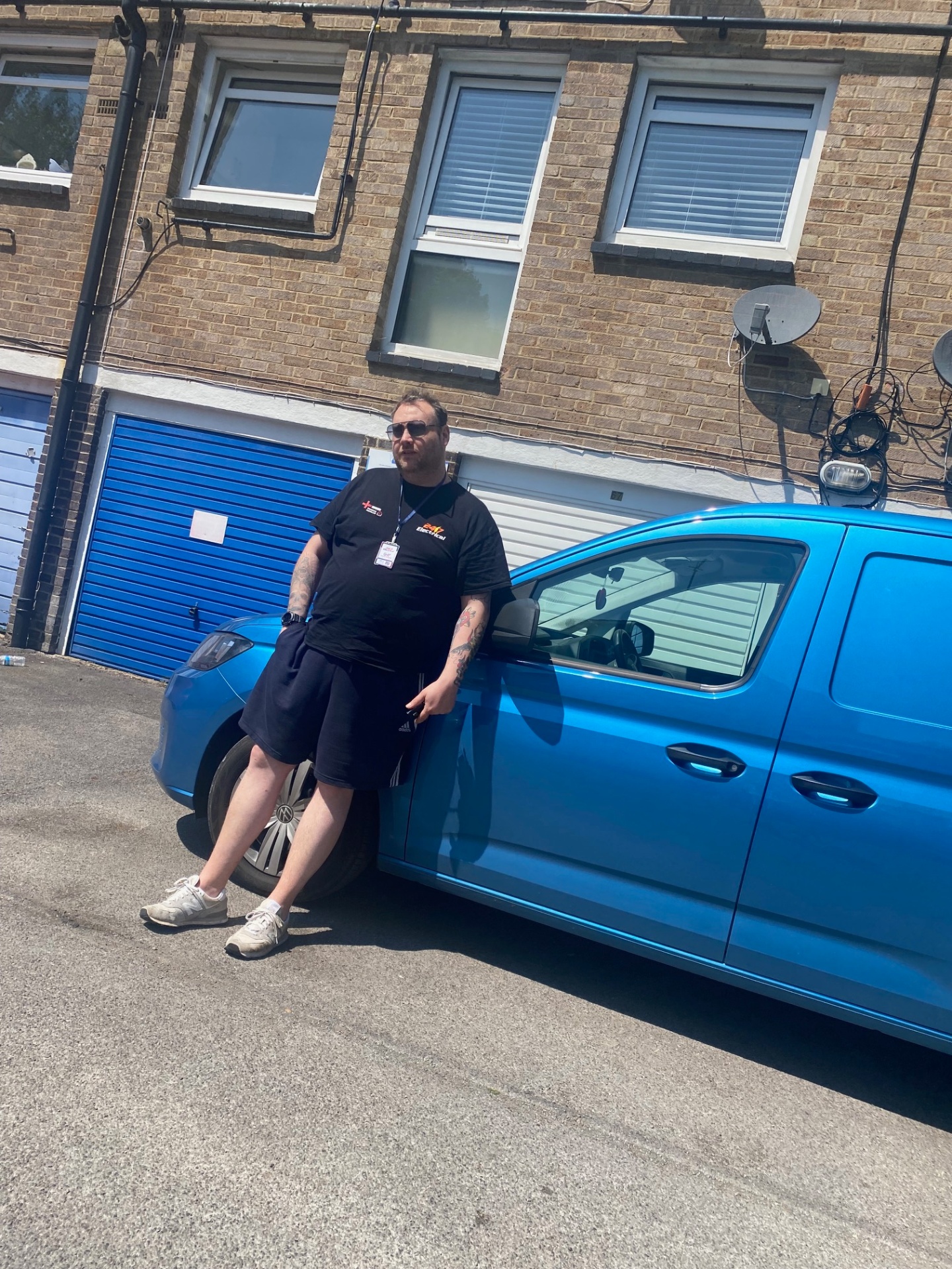 24/7 Electrical branded blue service van